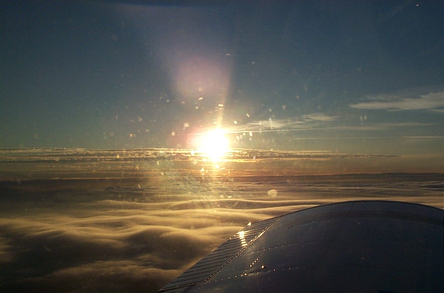 Wing of Cherokee GUKG over the Strait of Georgia during trianing flight.  December 3, 2008.  Langley Flying School.